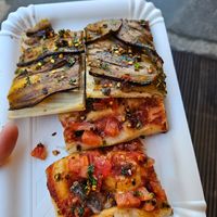 Aubergine abd tomatoe slices at Alice Pizza in Milan