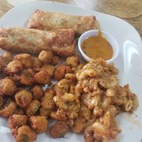 Philly egg roll with 2 sides and drink pictured with fried okra and mac-n-chz and honey mustard sauce at The Herbal Farmercy in Greenville