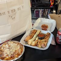 I ordered the Baked Ziti with focaccia and bread sticks with extra sauce. at Pizza Heaven Bistro in Phoenix