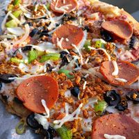 Pepperoni AND sausage (both plant-based). Yum! at Pizza Heaven Bistro in Phoenix