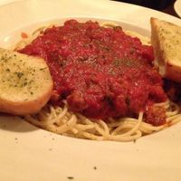 spaghetti w/ vegan soy sausage, served w/ vegan garlic bread  at Pizza Heaven Bistro in Phoenix