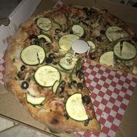 Got excited and ate a piece 🙈 Vegan veggie pizza!  at Pizza Heaven Bistro in Phoenix