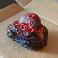 Date stuffed with peanut butter and chocolate .  at Loui in Munich
