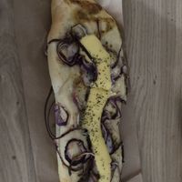 Cheese union baguette   at De Vegan Bakker in Heusden