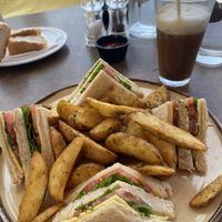 Vegan Club Sandwich with Fries and Freddo Cappuccino with Almond Milk  at Golden Beach Cafe in Naxos