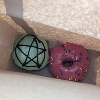 Avocado donut and the Simpsons donut, both vegan at Hideout Coffee Co in Portsmouth