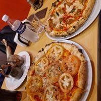 Argentinian napolitana (bottom) and no-chicken margarita (up) at Bella Napoli in Punta Cana