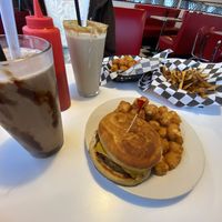 twisted green with vegan cheese, tots, and dairy-free chocolate shake and peanut butter shake  at Twisted Burger Diner in Flint