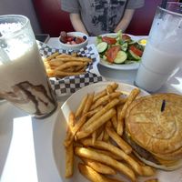 twisted green with vegan cheese, crispy fries, customized garden salad and a fruit cup with shakes  at Twisted Burger Diner in Flint