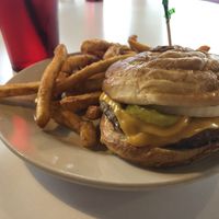 twisted green with vegan cheese, pickle, onion, ketchup and mustard with crispy fries  at Twisted Burger Diner in Flint