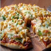 Vegetarian pizza  at Himalayan Organics Juice Bar and Cafe in Manali