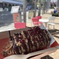 Hazelnut ice cream with my choice of toppings (raspberries, hazelnuts, coconut chips) and vegan chocolate sauce    at Happy Pops in South Brisbane