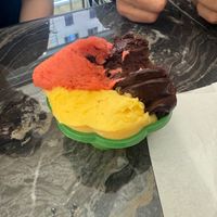 chocolate, passion fruit, and strawberry gelato at Gelateria S.M.Maggiore in Rome