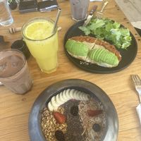 Avo toast with hummus and tomato salsa and the red fruit smoothie bowl.   at Romero in Huatulco