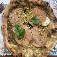 Pistachio pizza with vegan ham  at Pizzeria Assaje in Milan