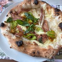 vegan meat wasnt bad but not crazy good. id go for tomato sauce base. at Pizzeria Assaje in Milan