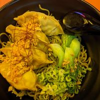 'Massaman Curry' dumplings and kale noodles ($18.50) at Dumpling N' Dips in New York City