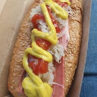 Vegan maple bacon sausage, sauerkraut, plant based bacon at 5 Dogs in Loganlea