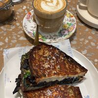 Mushroom toastie and soy latte  at Matilda in Mont Albert North