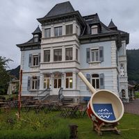 outside at Fondue Villa & Garden in Unterseen