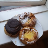 All vegan (cinnamon roll with chocolate, puff pastry with raspberry, puff pastry with vanilla) at Brauðgerðarhús Akureyrar in Akureyri