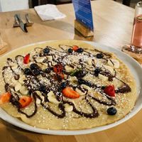 Pancake with banana and chocolate .  at Pirmas Blynas in Vilnius