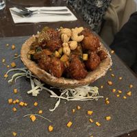 Kung Pow chickn (in a fried potato bowl)   at Ren Dao Asian Vegetarian in Elsternwick