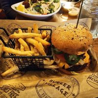 Lunch special: fries + veggie patty w/ I.M. Possible signature pairing toppings at Burger Village - Church Street in New York City