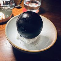 The passion fruit globe. Give it a good whack    at Mini Bar - José Avillez in Lisbon