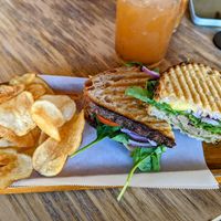 Pesto panini with chips and mango tea. at Goji Berry in Phoenix