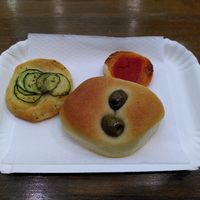 Plain roll with olives and mini pizza roll kind of things at Forno Roscioli Pietro - Esquilino in Rome
