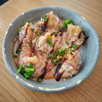 Wonton dumplings with shiitake mushrooms, soybean, sesame and chives. at Dwa Stoliki in Torun