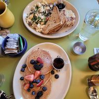 Vegan bliss pancakes and tofu scramble with sourdough and hashbrowns at Snooze in Atlanta