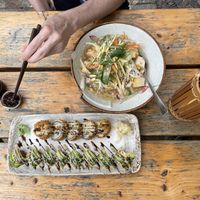 Pho Tron Chay and sushi at an outdoor table  at Quan Xua in Leipzig