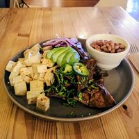 Chilaquiles con salsa de mole, tofu y frijoles enteros (⚠️ask for vegan salsa⚠️) at Avocato Cocina Creativa in Puerto Penasco