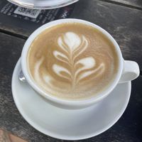 Cappuccino with oat milk  at  Cafe Einstein in Emden