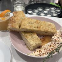 House made focaccia with homemade feta and hot honey   at Salt and Pepper Social in Newcastle