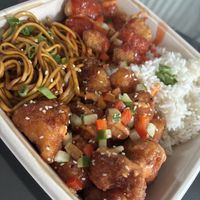 Bang bang cauliflower with noodles, sweet and sour chkn with boiled rice. This was the phat vegan 2 mains, all came in one box.   at WowYauChow - temporarily closed in Swinton