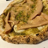 Pizza mortadella e pistacchio veg  at Assaje in Udine