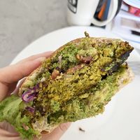 What's inside? Vegan falafel burger with guacamole and homemade sourdough bread. at Dzen of Food in Yerevan