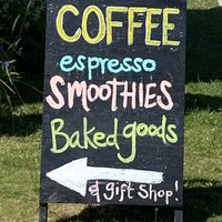 Signs on road  at The Dream Bean Machine in Grand Marais