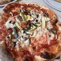 Pick your ingredients for the vegan pizza😄 at Gusto in Ystad