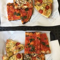 Mushroom pizza, spicy garlic-chili-parsley pizza (my favorite) and tomato zucchini foccatia  at Il Fornaio Leandro in Rome