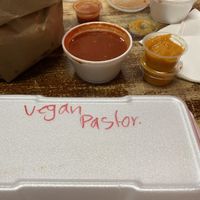 Vegan pastor burrito, vegan cheese sauce, beans  at Tanias 33 Dos Mundos in Tucson