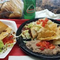 4 plate combo. Cauliflower rolled taco, vegan tamale, nopalitos Colorado hard taco and enchilada cibil at Tanias 33 Dos Mundos in Tucson