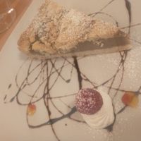 Hazelnut cake .homemade  coconut cream at Ristorante Peruggini in Vistarino