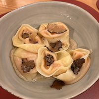 Ravioli di zucca su crema di porcini e tartufo  at Ristorante Peruggini in Vistarino
