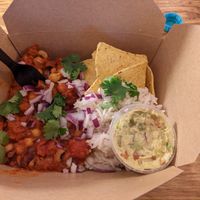 The vegan chili with half'n half rice and Nachos, guacamole, fresh coriander and red onions at The Chili Shack in Galway