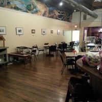 View of side and back seating area. at Downtown Central Perk in Davenport