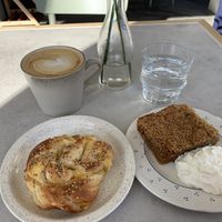 Carmel latte, cheesy bread and coconut coffee cake   at Plantan Kaffihús in Reykjavik